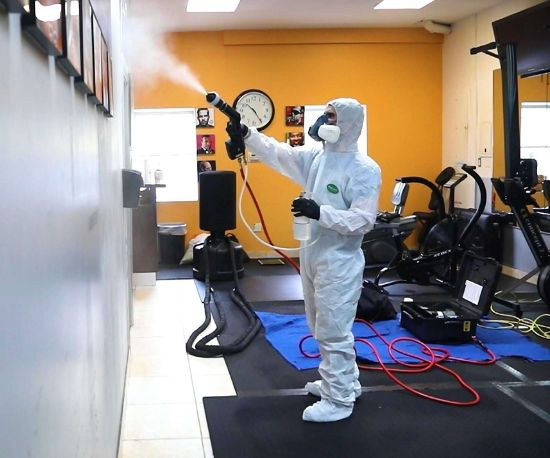 a disinfection team doing disinfection in dubai
