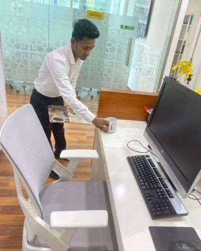office boy is serving tea